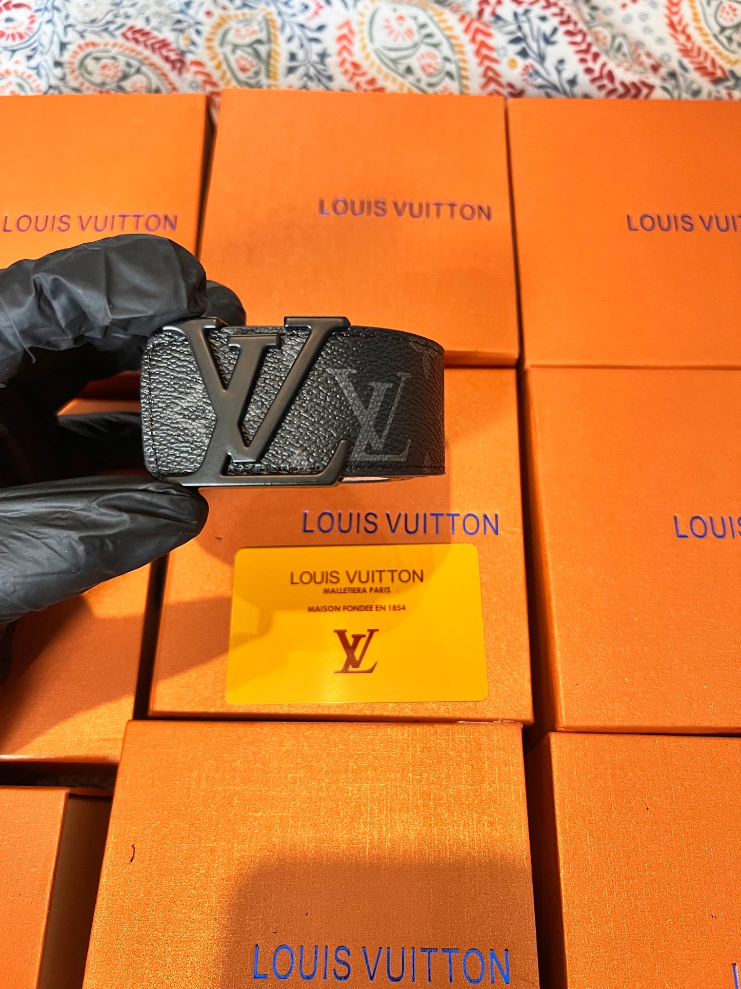 Black L buckle belt with box