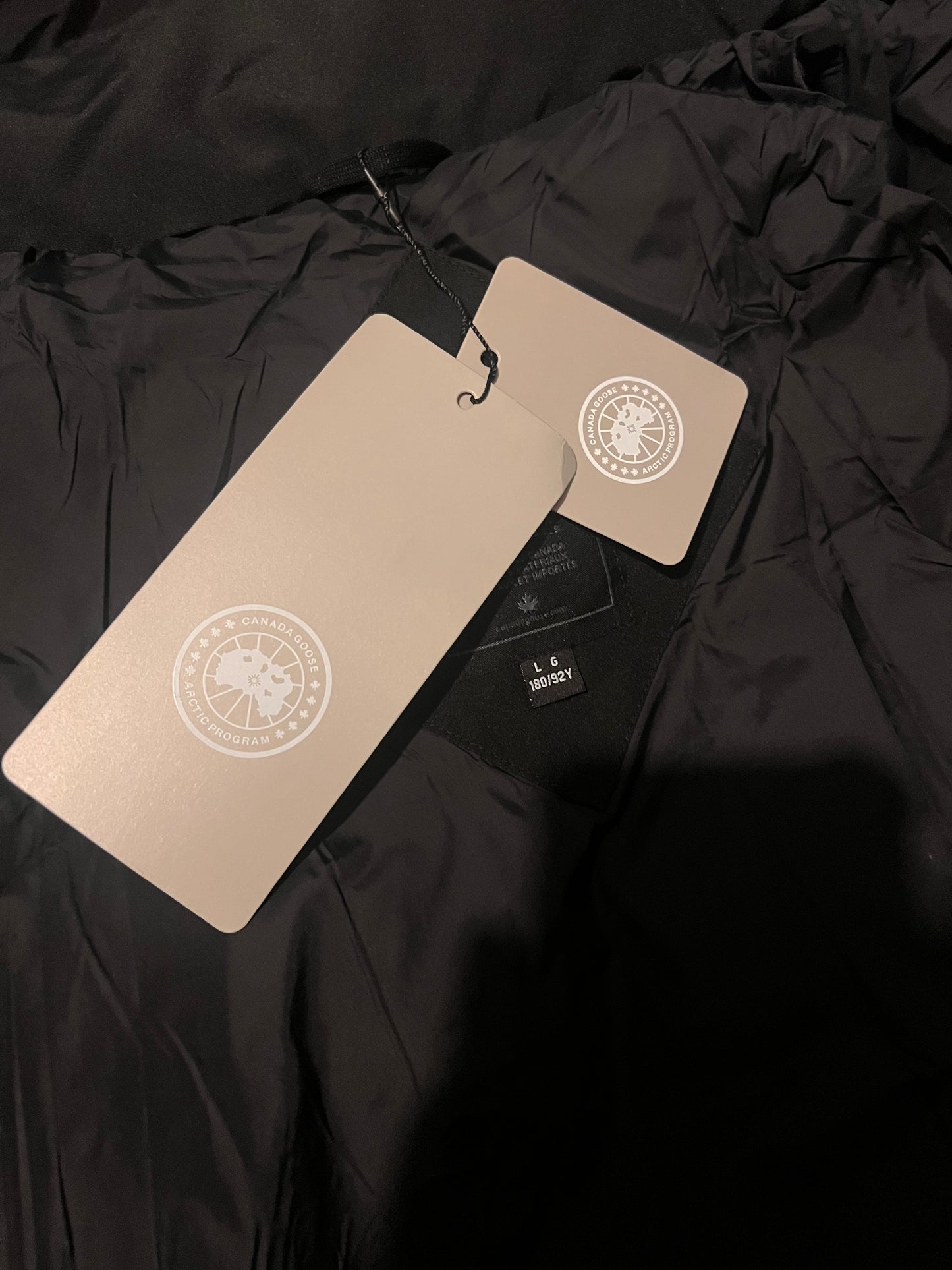 C goose Puffer black badge with fur